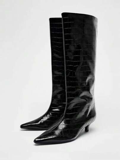 Botas altas negras con botones