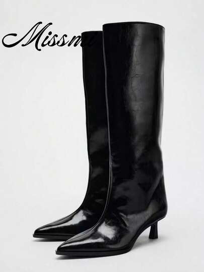 Botas altas negras de tacón fino